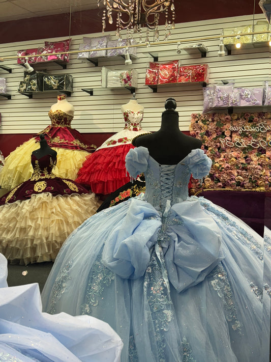 Baby blue quinceañeras dresse