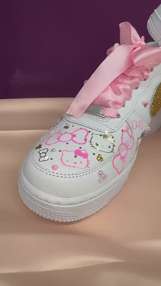 Nike hello kitty pink and gold